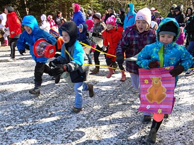 RUNNING INTO SPRING! The thrill of an egg-citing search brings smiles and laughter to Campobello youngsters during the sixth annual community Easter egg hunt in Herring Cove Provincial Park.