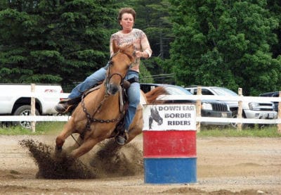 WHOOPEE TI YI YO! A rider competes in a barrel-racing event at the June 21 horse show held by the Downeast Border Riders at the Pembroke Fairgrounds. (John Lynch photo) Subscribe to Quoddy T