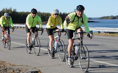 WAVING as they ride along the causeway after their stay in Eastport are some of the over 400 cyclists who participated in the BikeMaine event Downeast. (Edward French photo) Subscribe to Quo