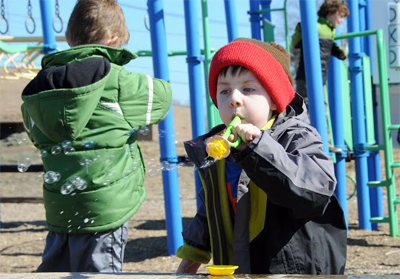 BUBBLES OF JOY are blown by five-year-old Charlie Renner on a spring afternoon at the playground by the Eastport Elementary School. (Edward French photo) Subscribe to Quoddy Tides Rates:$31.