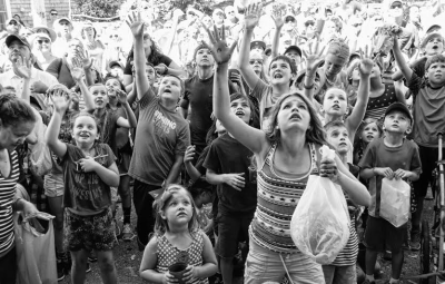 THE PENNY SCRAMBLE during the Eastport Fourth of July celebration always generates youthful excitement. Although a Navy ship was not in port and the breakwater is being repaired, the celebra
