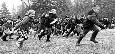 RUNNING INTO SPRING! Undeterred by the foggy wet weather was a crowd of youngsters participating in Grand Manan’s annual Easter egg hunt at Anchorage Park on April 19. Eggs were scattered ac