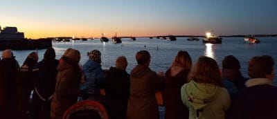 A CROWD WATCHES as lobster fishermen leave the wharf at North Head on Grand Manan to set traps early in the morning on November 8, the first day of the season. (Shari Leslie photo)