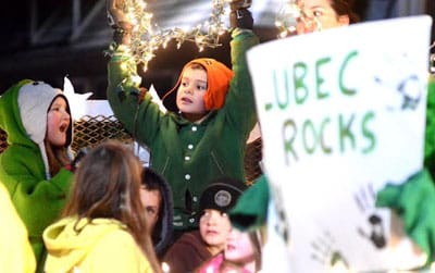 Riding a float on Water Street on a cold evening are Lubec students participating in the annual Parade of Lights. JD Rule photo Subscribe to Quoddy TidesRates: $30 per year within Washington