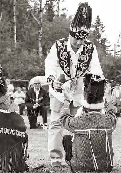 THE PIPE CEREMONY during the 50th Ceremonial Indian Day at Sipayik included the presentation of the pipe from Penobscot Sakom Kirk Francis to Clayton Cleaves, in the role of Passamaquoddy sa