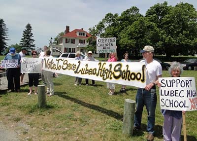 "VOTE TO SAVE LUBEC HIGH SCHOOL!" chant residents at a rally held on June 22 in support of keeping the high school open next year. The next day, though, townspeople voted, by a narrow margin