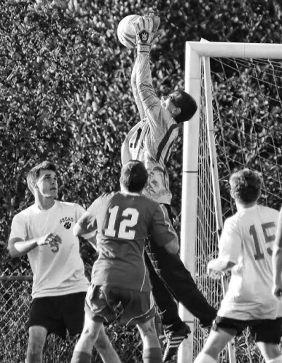 MAKING A SAVE is Shead goalie Isaac Curtis during a soccer game against Jonesport on October 3. The Tigers won and, as of October 12, had a 4-7-1 season record. (Don Dunbar photo) Subscribe 