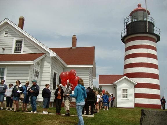 THE ALLURE OF LIGHTHOUSES attracted many enthusiasts who were delighted to climb the lower steps to the top during West Quoddy Head Light's 200th anniversary celebration on Saturday, July 19