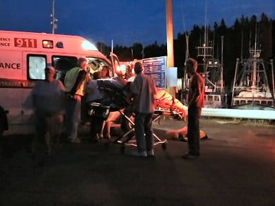 AMBULANCES RESPOND at the Head Harbour wharf, Campobbello, after a boating accident off Casco Island on Saturday night, August 21. The five people who were rescued by the crew of the Micheal