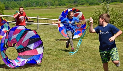 THE RUNNING OF THE BOLS. The Bold Coast Sea & Sky Festival in Machias provided plenty of opportunity for youth to test their skill and speed at Middle River Park. A bol is a spinning basket 