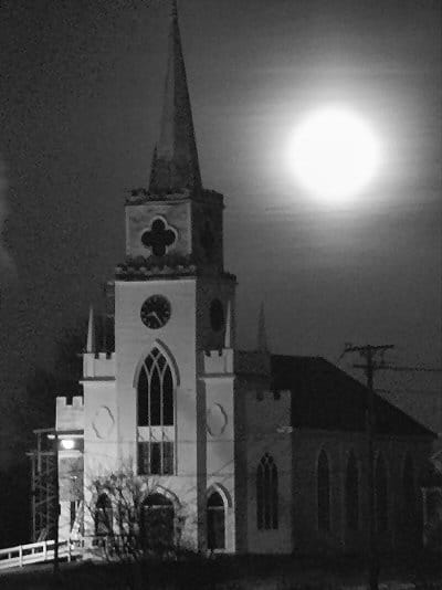 BALSAM AND LIGHTS decorate the exterior of St. Joseph's Catholic Church in Eastport this Christmas season. (Edward French photo) Season of goodwill shines in communities BALSAM AND LIGHTS de