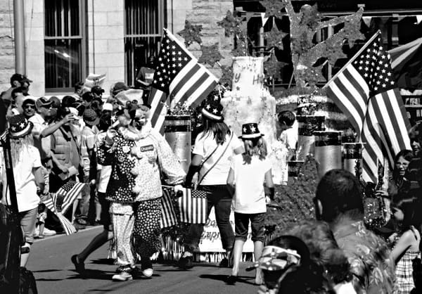 EASTPORT'S SPIRITED FOURTH included a clown getting caught up in the spirit of the Dance Expression troupe during the Grand Parade, sailors watching the fireworks from the deck of the U.S.S.