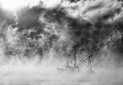 DRAGGING for scallops through the seasmoke on a recent cold morning in Cobscook Bay is the Burton G. (Don Dunbar photo)