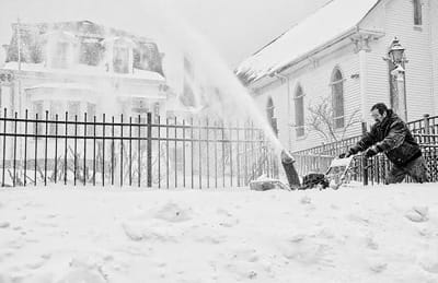 LET IT SNOW! (But not as much as last year, though!) Dale Bowen uses a snowblower to clear the walks at St. Joseph’s Catholic Church in Eastport following the December 27 snowstorm that dump