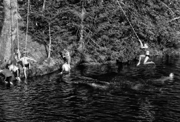 COOLING OFF on a hot summer's day are these youth at Little Falls in Pembroke. (Edward French photo)