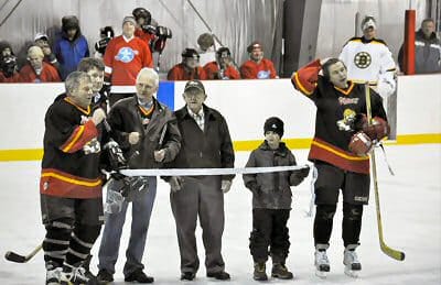BEFORE THE PUCK IS DROPPED for the NHL Legends charity game against the Grand Manan locals on January 20, the ribbon is cut for the Grand Manan Community Centre ice rink. Shown are MLA Rick 