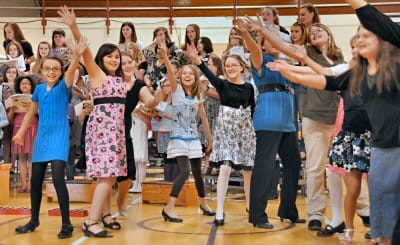 "DANCE, DANCE, DANCE" was one of the pieces sung and performed by the concert chorus during the Washington County Music Festival on March 31 at Woodland High School. Sixteen county schools w