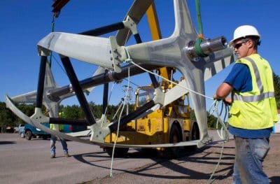 MOVING one of Ocean Renewable Power Company's four turbines in preparation for alignment is Bradley McLean, a Perry Marine and Construction worker. (Jeffrey Hains photo)
