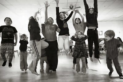 JUMPING EARLY INTO SPRING! Learning about rhythm in music through body movement during the Paper Orchestra camp at the Eastport Arts Center are some of the participants. (Robin Farrin photo)