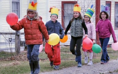 LET'S HAVE A PARADE! Celebrating spring with a march through town are Lulu Calame, Kieran Weston, Cora Sanchez, Katie Bartlett andd Sarah Bartlett. They were taking part in the April vacatio