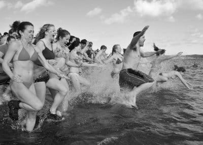 MAKING A SPLASH at the start of the Polar Bear Dip on Friday, February 3, are some of the participants who helped raise $15,000 this year for the Ronald McDonald House in Bangor. The amount 
