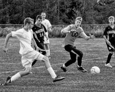GETTING past the goalie and scoring against Machias in a September 18 soccer game is Drew Greenlaw of Shead High School in Eastport. (Don Dunbar photo)