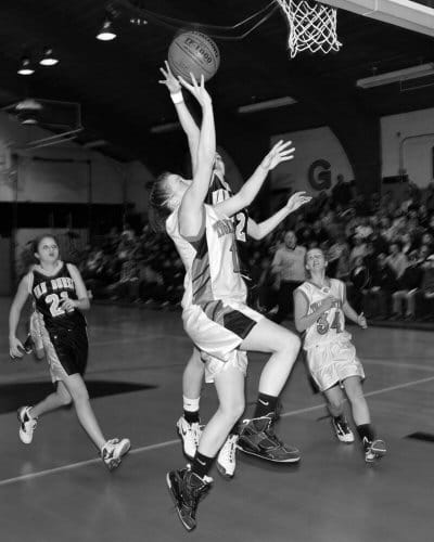 DRIVING TO THE BASKET to score is Shead's Vanessa Patterson in the February 15 preliminary game played in Eastport against Van Buren. Shead pulled out a two-point victory, but then lost in t