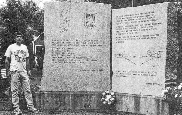 STANDING NEXT TO the Washington County Vietnam Veterans Memorial in Baileyville is the late Brian Manza. The memorial, the first in the country to honor Agent Orange victims, was erected in 