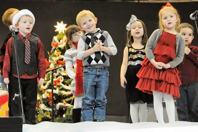 SINGING "DING-DONG" during the Eastport Elementary School's winter holiday concert on December 17 are K4 and K5 students. Along with the performances by the elementary school grades, differe