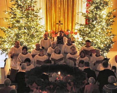 CELEBRATING THE SPIRIT OF CHRISTMAS, the Dennysville Festival Choir sings during the Festival Nine Lessons & Carols at the Dennysville-Edmunds Congregational Church on December 21. (Edward F