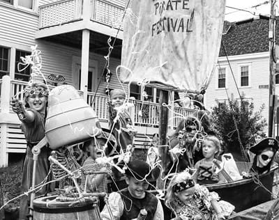 MAKING ITS WAY down Washington Street is the Pirates of Mudflat Cove float during the Eastport Pirate Festival. (Don Dunbar photo)