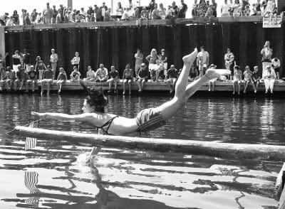 A DOWNEAST MARITIME FOURTH. THE FOURTH OF JULY IS CELEBRATED AROUND THE BAY with many traditions centered on the water. Successfully grabbing the flag during the Greasy Pole contest in Eastp