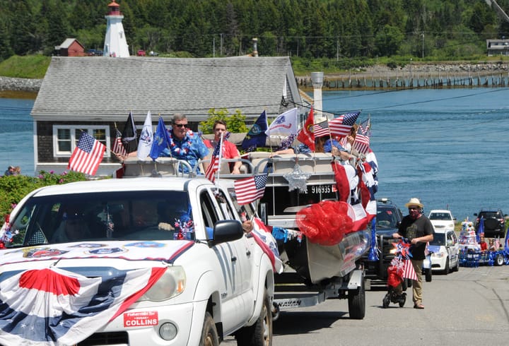 THE FOURTH OF JULY was celebrated Downeast with parades in Lubec and Pembroke, along with the First Responder Parade. A flag-waving float (above) led off the Lubec parade. (Edward French pho