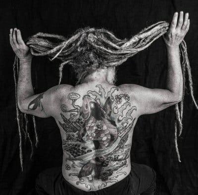 THE TATTOO PHOTO SHOOT at Rose Garden Cafe and Design in Eastport was a hit. Robin Farrin now has a good selection of photos to be voted on for her September exhibition at the Rose Garden. T