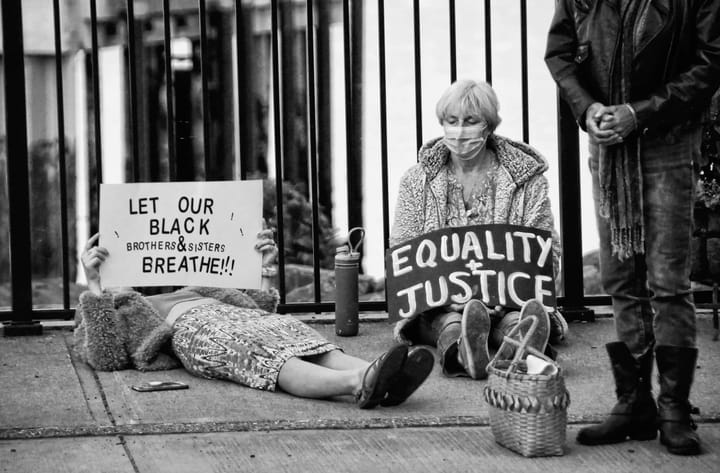 A PEACEFUL VIGIL in support of Black Lives Matter was held in downtown Eastport on June 8. In honor of George Floyd, participants observed 8 minutes and 46 seconds of silence ' the length of