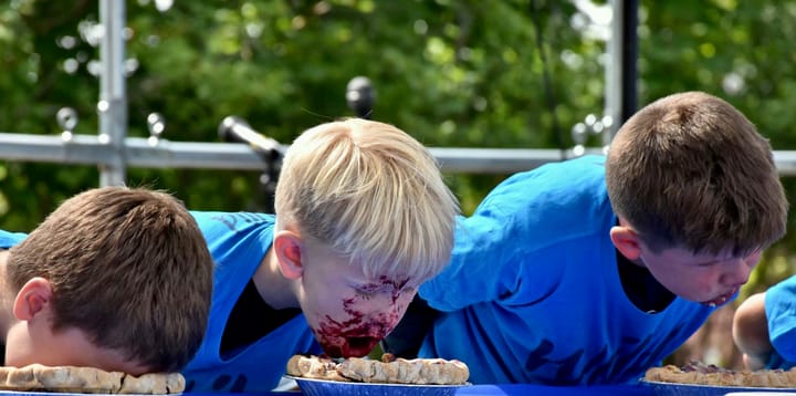WHAT WOULD A WILD BLUEBERRY FESTIVAL be without the ever-popular blueberry pie-eating contest. This year's event in Machias drew a large crowd as many boys, girls and some adults tried their